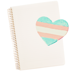 photo of a spiral notebook with a chalk-drawn heart in the trans pride colors